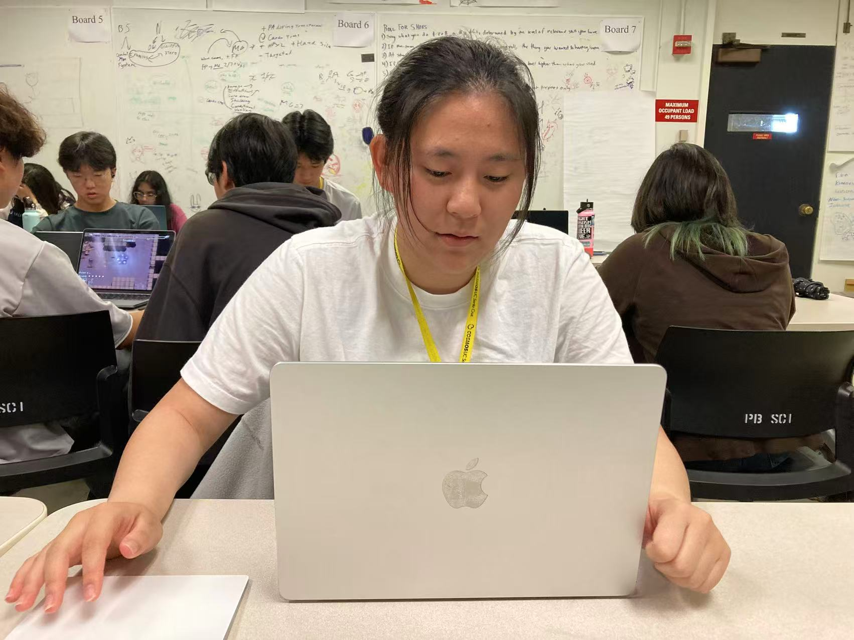 Team collaboration during COSMOS Week 1 — planning and discussing game ideas together.