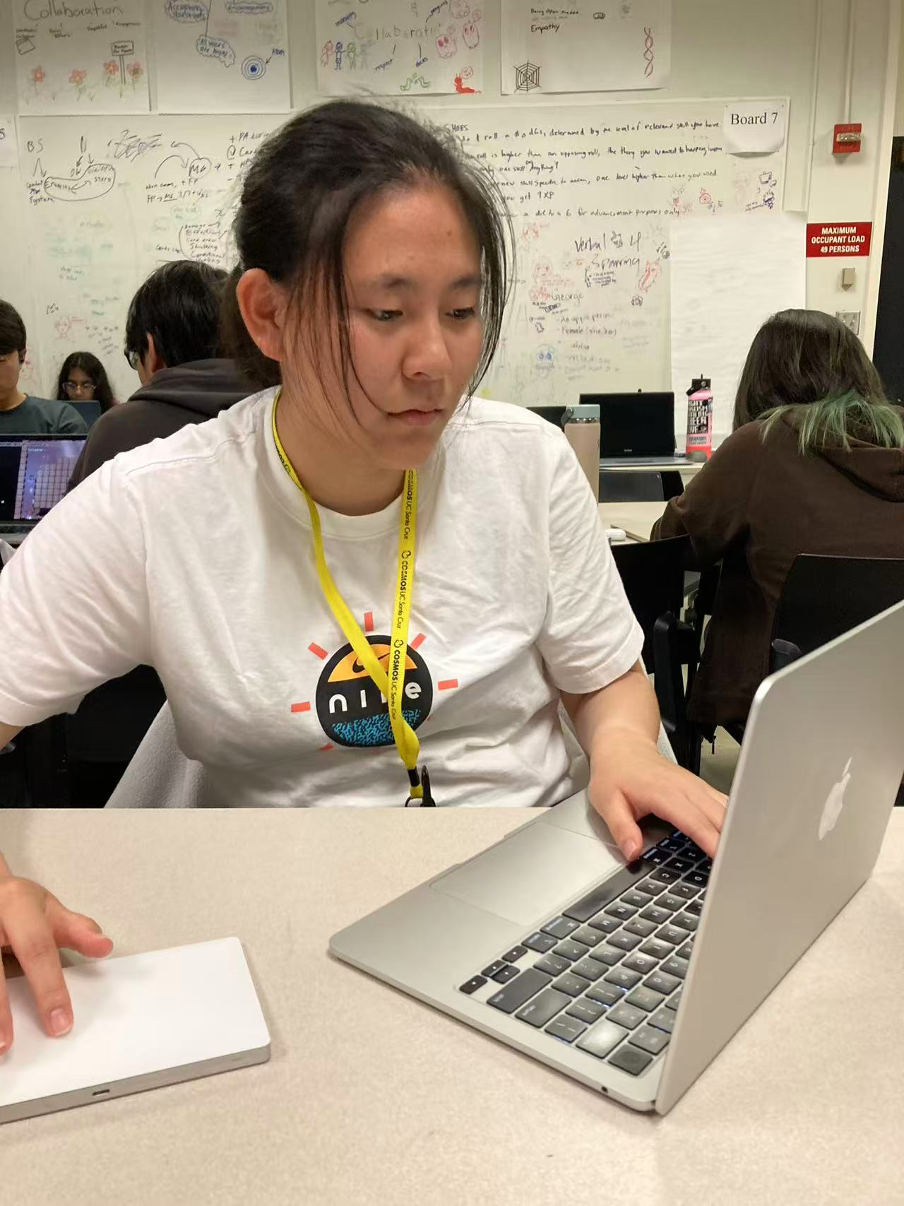 Presenting a Week 2 prototype to the cluster — practice pitching, demos, and team communication.